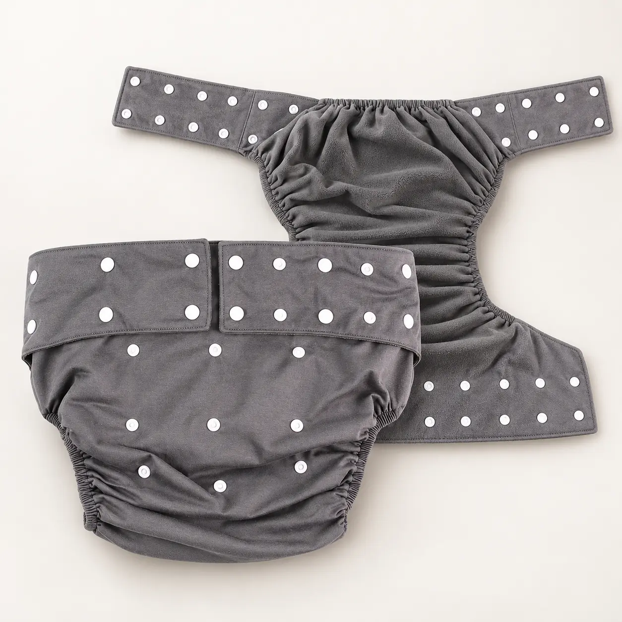Reusable adult diaper with a discreet underwear-like cut and a bamboo charcoal lining